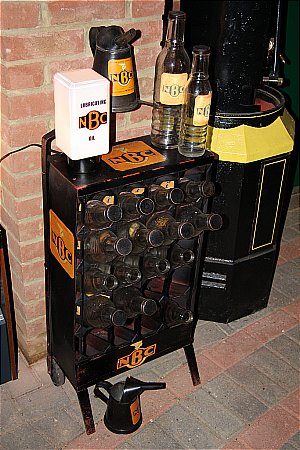 N.B.C. OIL BOTTLES & RACK - click to enlarge